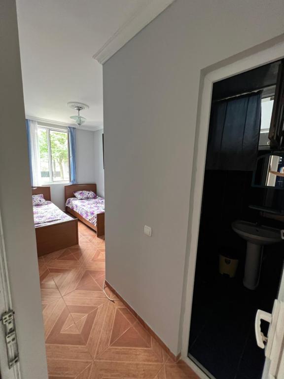 Postel nebo postele na pokoji v ubytování Saba Guest House