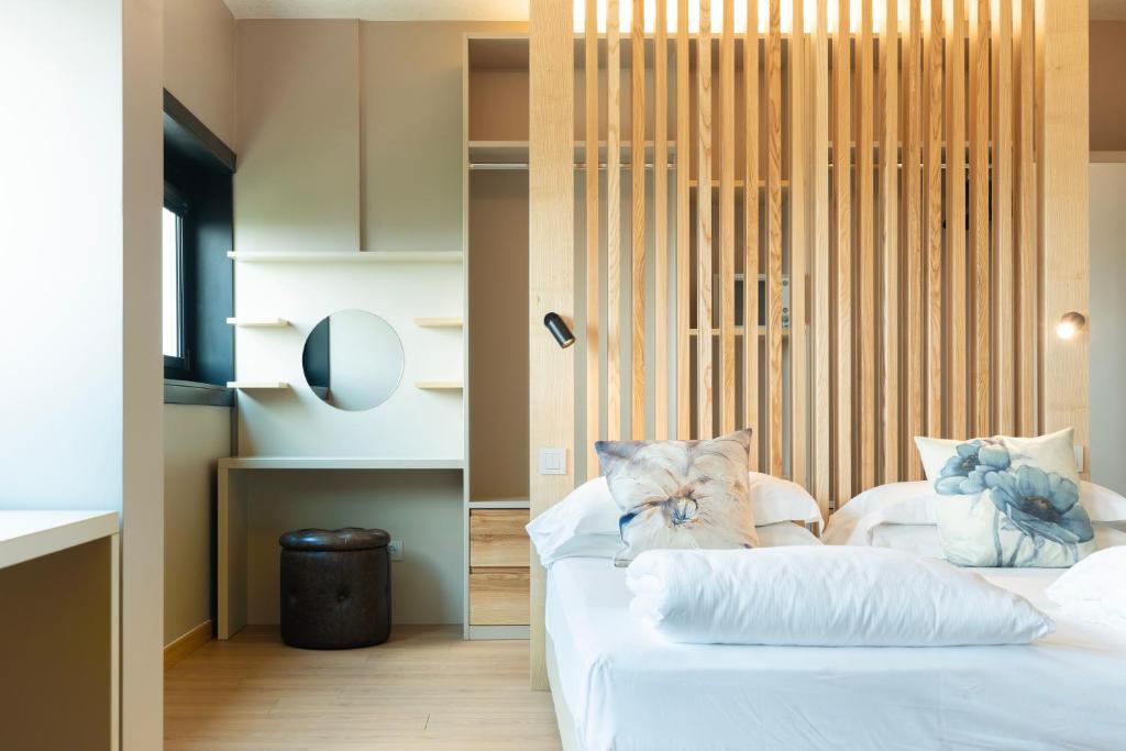 Voodi või voodid majutusasutuse Hotel Saccardi & Spa - Adults Only toas