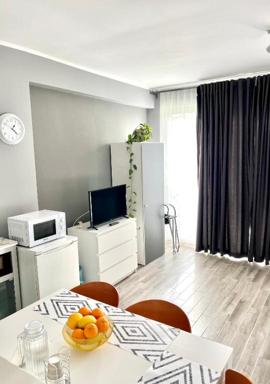 TV a/nebo společenská místnost v ubytování B&B Le Palme