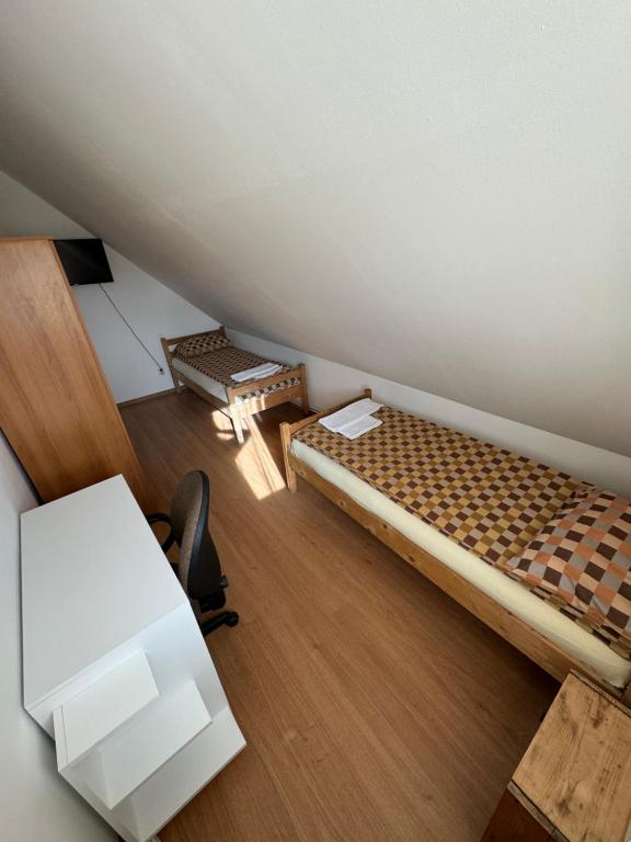 Postel nebo postele na pokoji v ubytování Sport Hostel Cluj