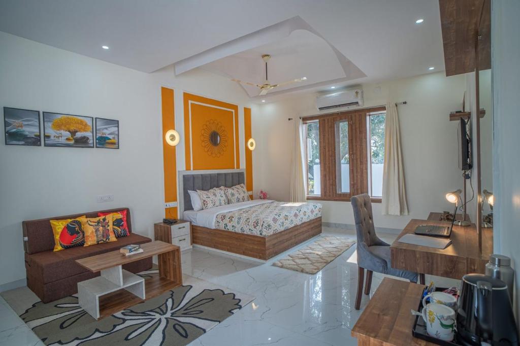 Postel nebo postele na pokoji v ubytování Hriday Bhoomi - Luxury Cottages & Villa in Jim Corbett