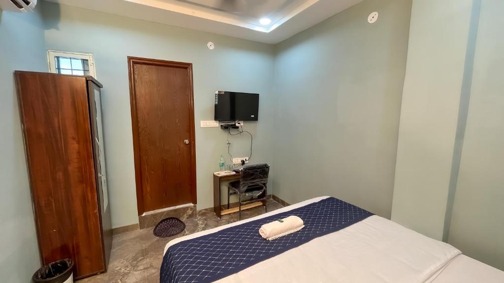 TV a/nebo společenská místnost v ubytování Hotel Abhinanadan