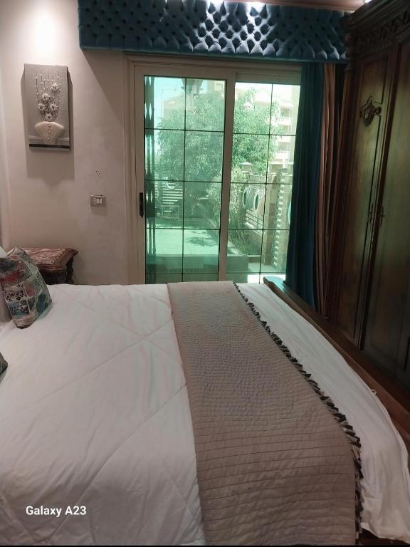 Dreamland Cosy 2 BR with garden and pool access - Two-Bedroom Apartment With Garden View
