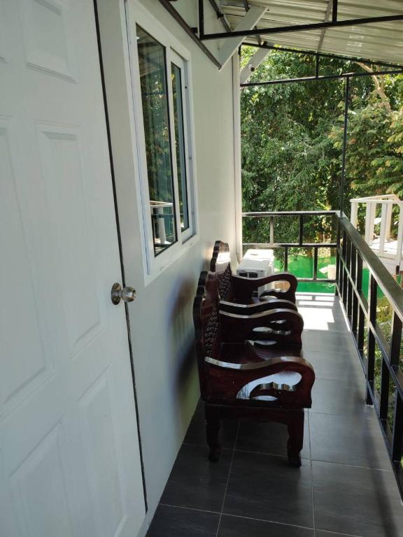 Balkón nebo terasa v ubytování Kitty Guesthouse
