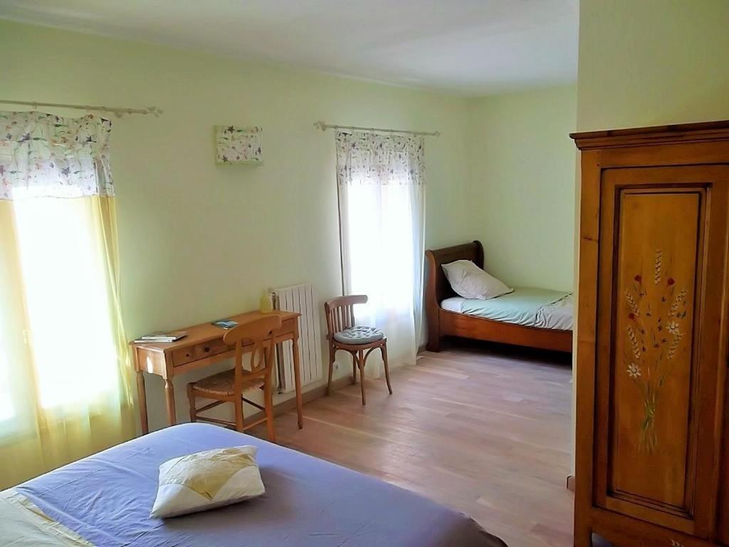 Postel nebo postele na pokoji v ubytování Comme un écrin... Chambres et table d'hôtes