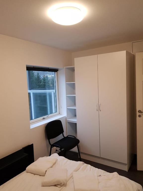 Postel nebo postele na pokoji v ubytování Lagunen Apartments