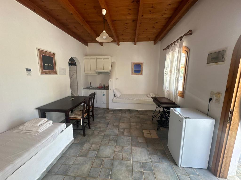Postel nebo postele na pokoji v ubytování Galini Tropica