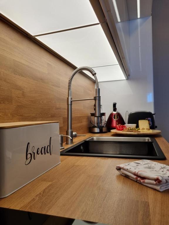 Kuchyňa alebo kuchynka v ubytovaní Apartment Amour Luxe