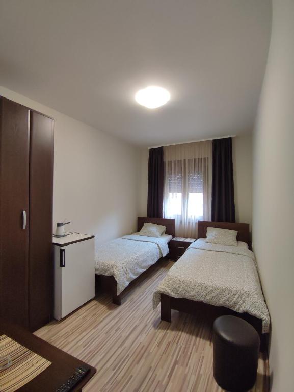 Ένα ή περισσότερα κρεβάτια σε δωμάτιο στο Coco Studio Apartment