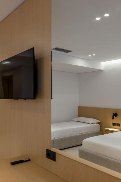 Postel nebo postele na pokoji v ubytování Austin Boutique Hotel