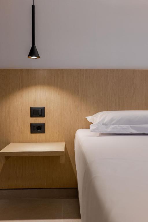 Postel nebo postele na pokoji v ubytování Austin Boutique Hotel