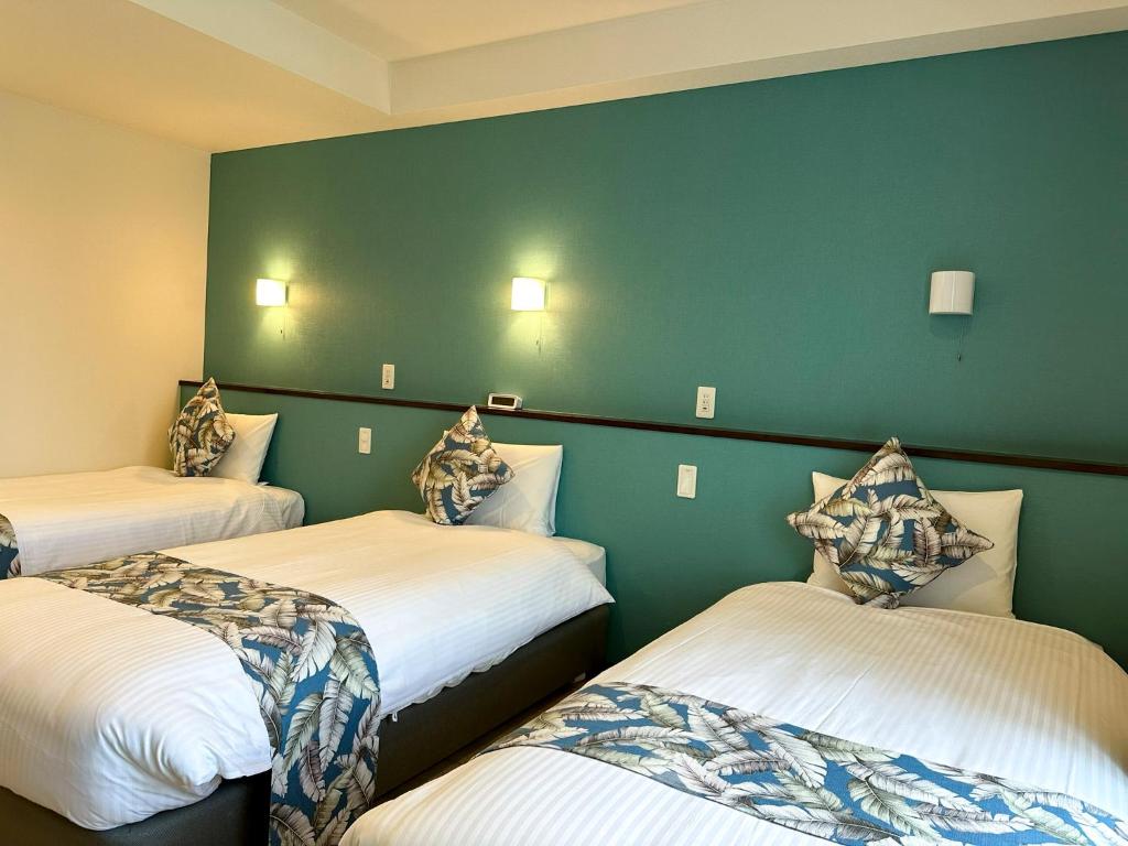 KOHALA　HOTELにあるベッド