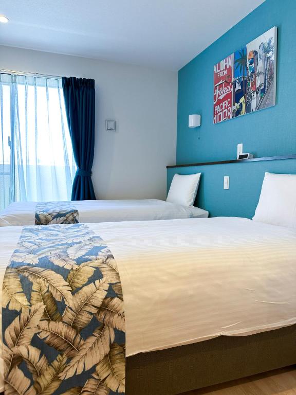 KOHALA　HOTELにあるベッド