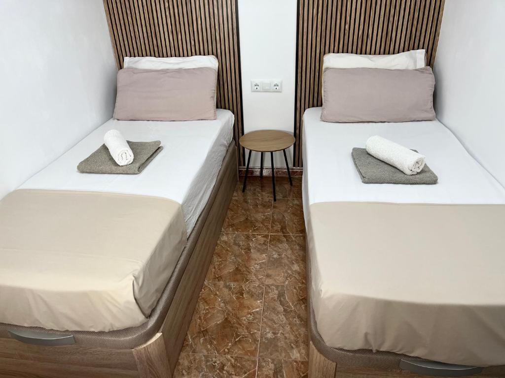 Postel nebo postele na pokoji v ubytování Santomera 1st Line