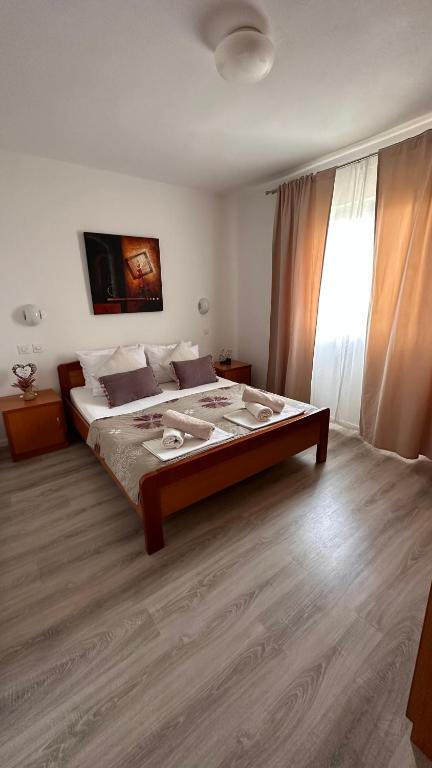 Postel nebo postele na pokoji v ubytování Apartments Oxygen