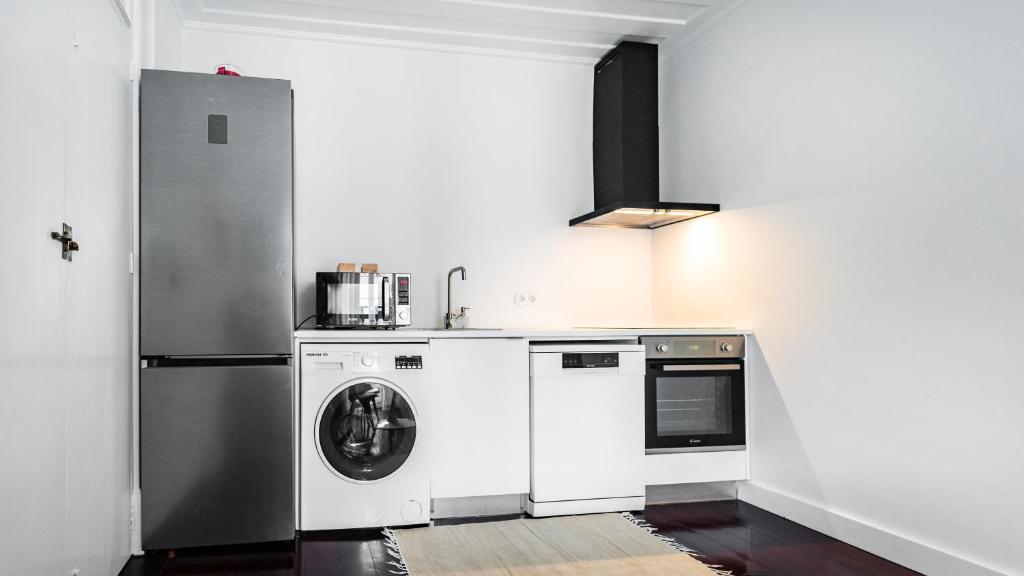 Kuchyň nebo kuchyňský kout v ubytování CASA de FORO - Apartamentos Turísticos