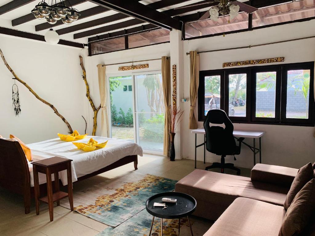 Postel nebo postele na pokoji v ubytování The Summer House Samui