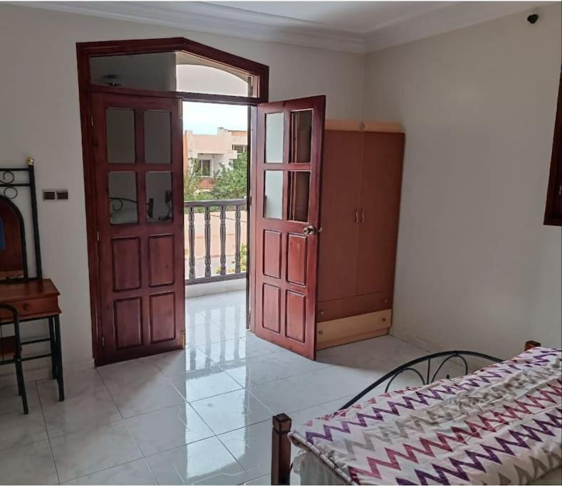 Postel nebo postele na pokoji v ubytování Villa Française à Saidia Dallas