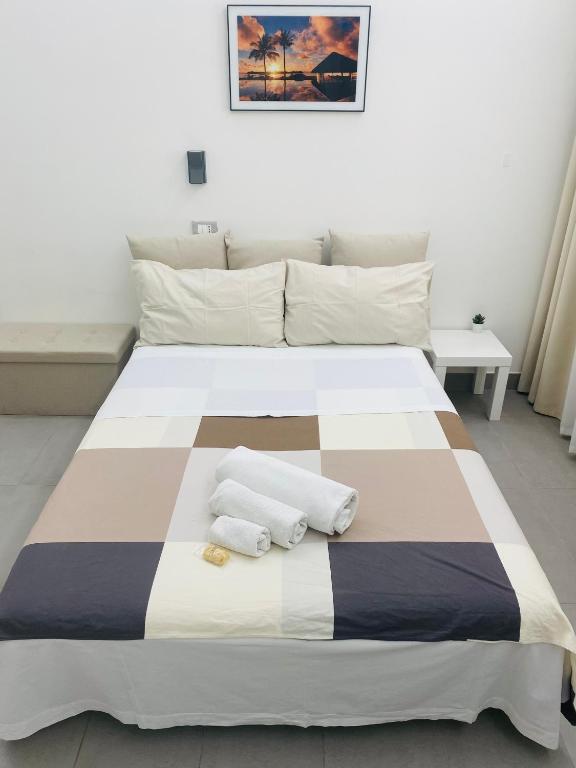 Postel nebo postele na pokoji v ubytování Sicilian Rooms