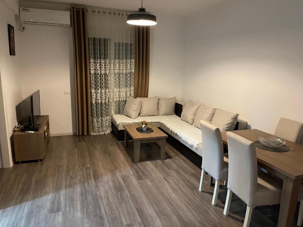 TV a/nebo společenská místnost v ubytování Apartmani B&A