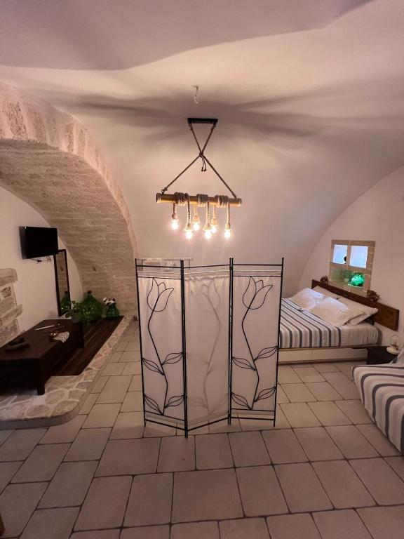 A television and/or entertainment centre at La Cantina Guest House