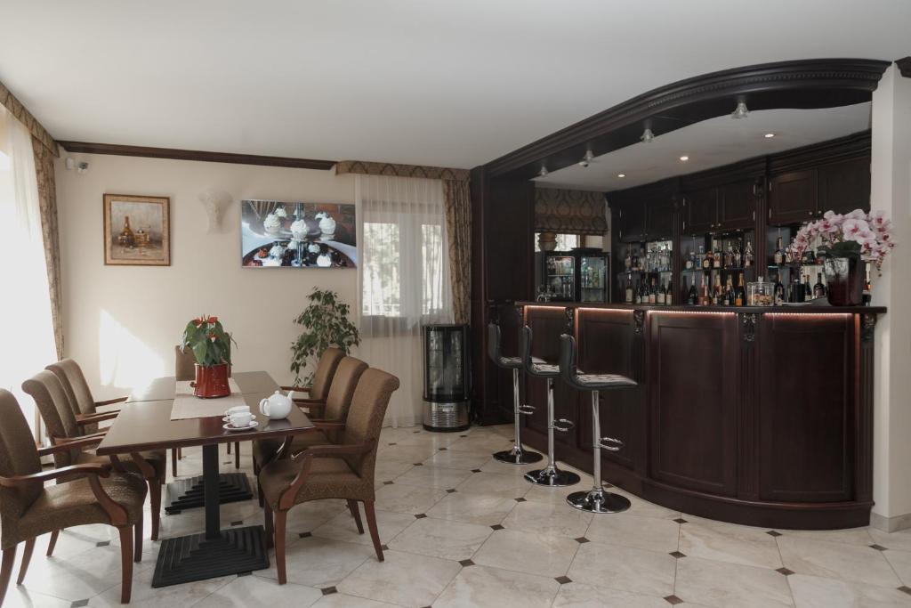 Lounge nebo bar v ubytování Pušynė