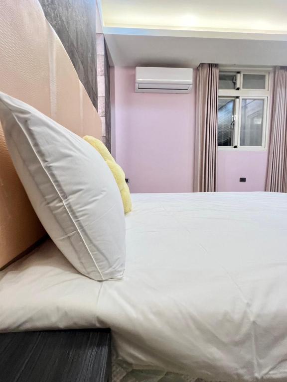 Katil atau katil-katil dalam bilik di Kinmen Harved B&B