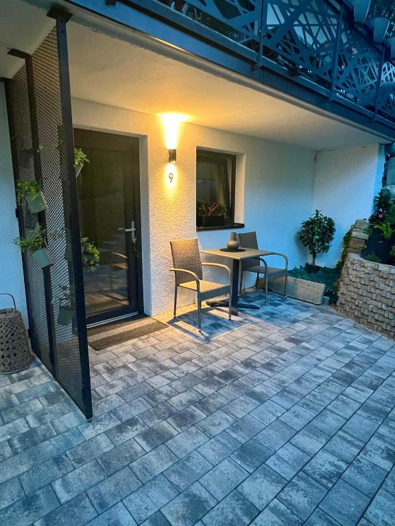 Patio nebo venkovní prostory v ubytování Alpha Rooms