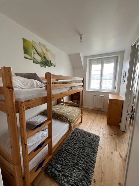 Postel nebo postele na pokoji v ubytování Villa les Flots