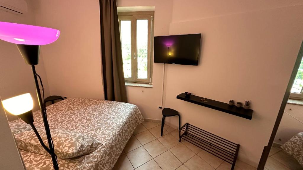 Postel nebo postele na pokoji v ubytování Amly's Room