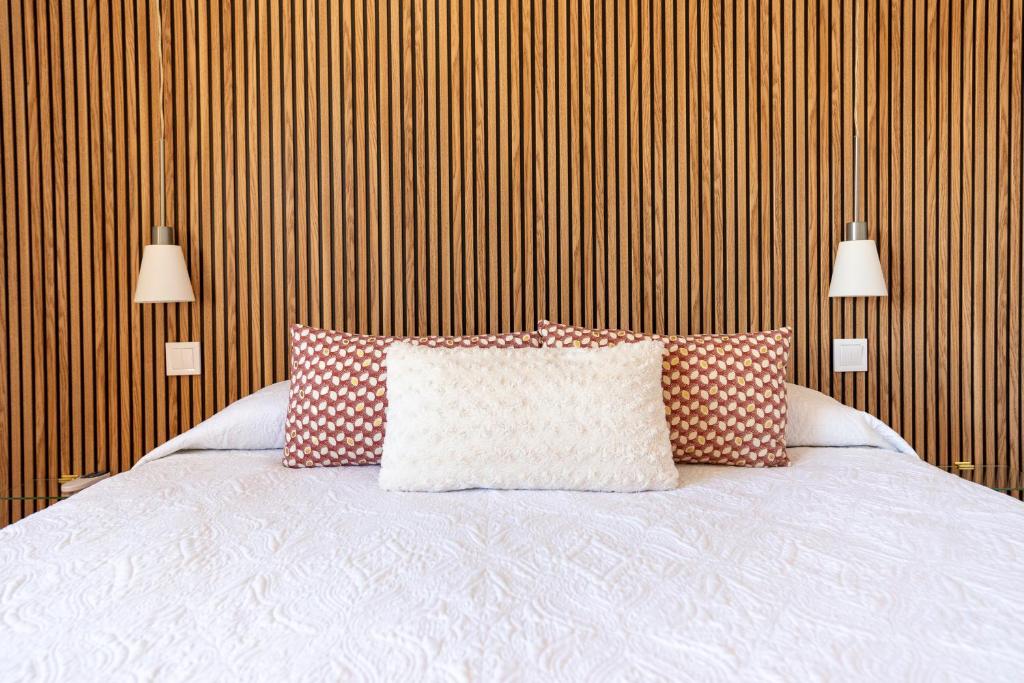 A bed or beds in a room at ApartRincón Candelaria