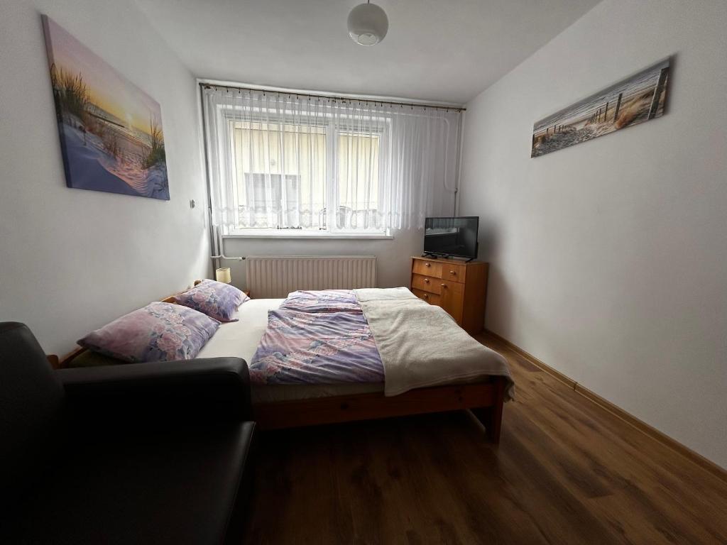 Posteľ alebo postele v izbe v ubytovaní Pokoje gościnne ZUZA