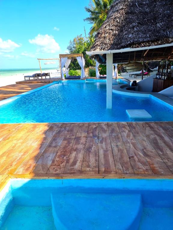 Bazén v ubytování Blue Palm Zanzibar nebo v jeho okolí