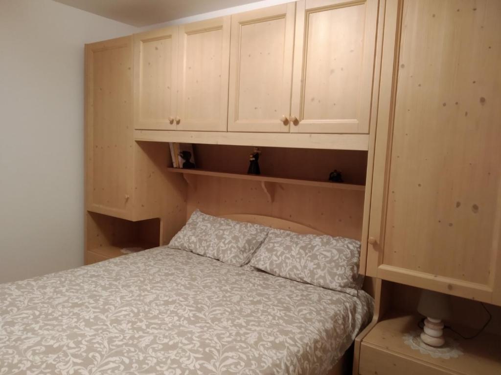 Postel nebo postele na pokoji v ubytování Andalo, Residence al Girasole FamPedron
