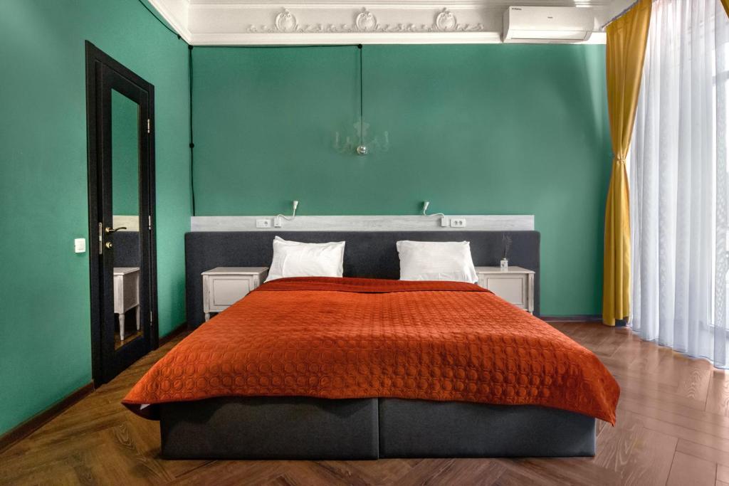 Postel nebo postele na pokoji v ubytování Apart Hotel Michelle