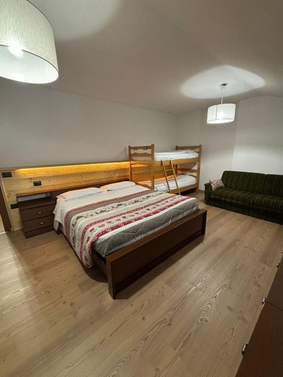 Postel nebo postele na pokoji v ubytování Hotel Miravalle