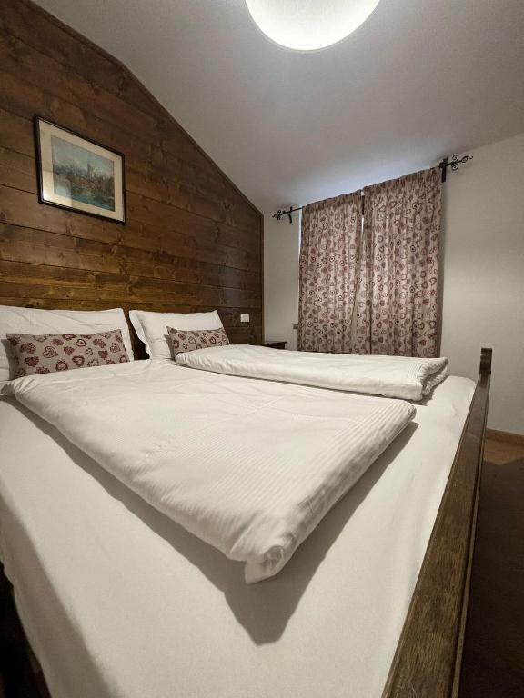 Postel nebo postele na pokoji v ubytování Hotel Miravalle