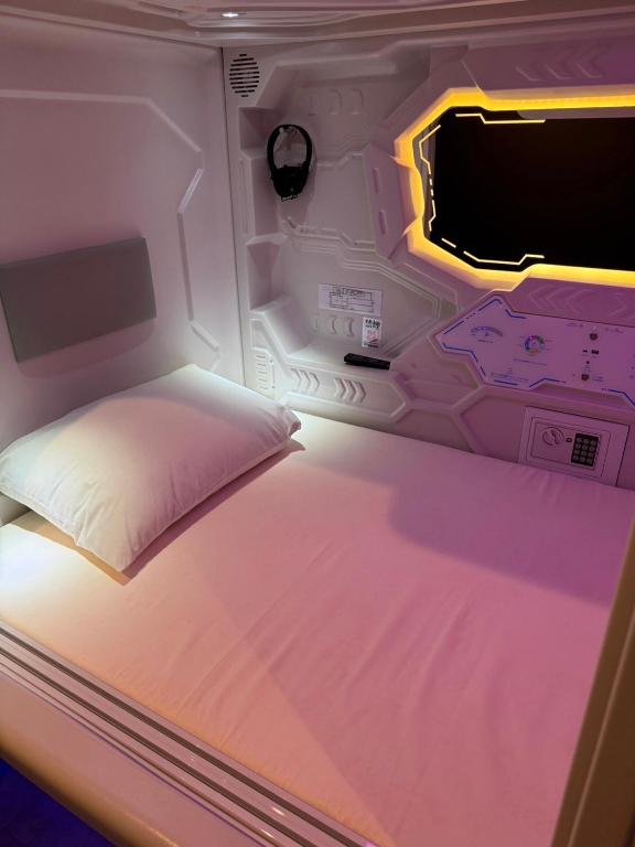 Postel nebo postele na pokoji v ubytování Hotel Galaxy Pod