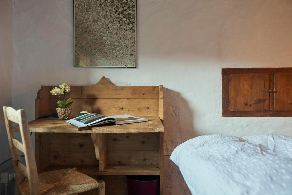 Postel nebo postele na pokoji v ubytování Dormì & Disnà