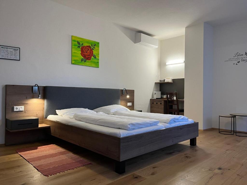 Postel nebo postele na pokoji v ubytování Rebenlandhof