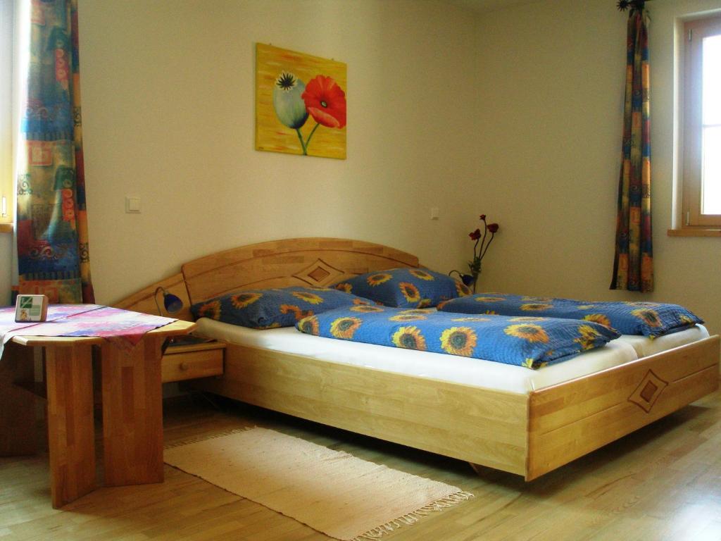 Postel nebo postele na pokoji v ubytování Rebenlandhof