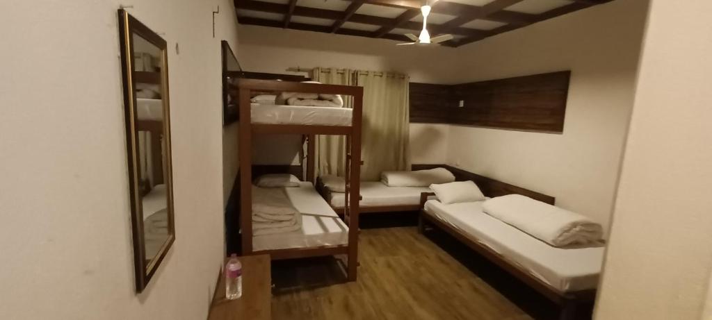 Rúm í herbergi á Hotel Dolly