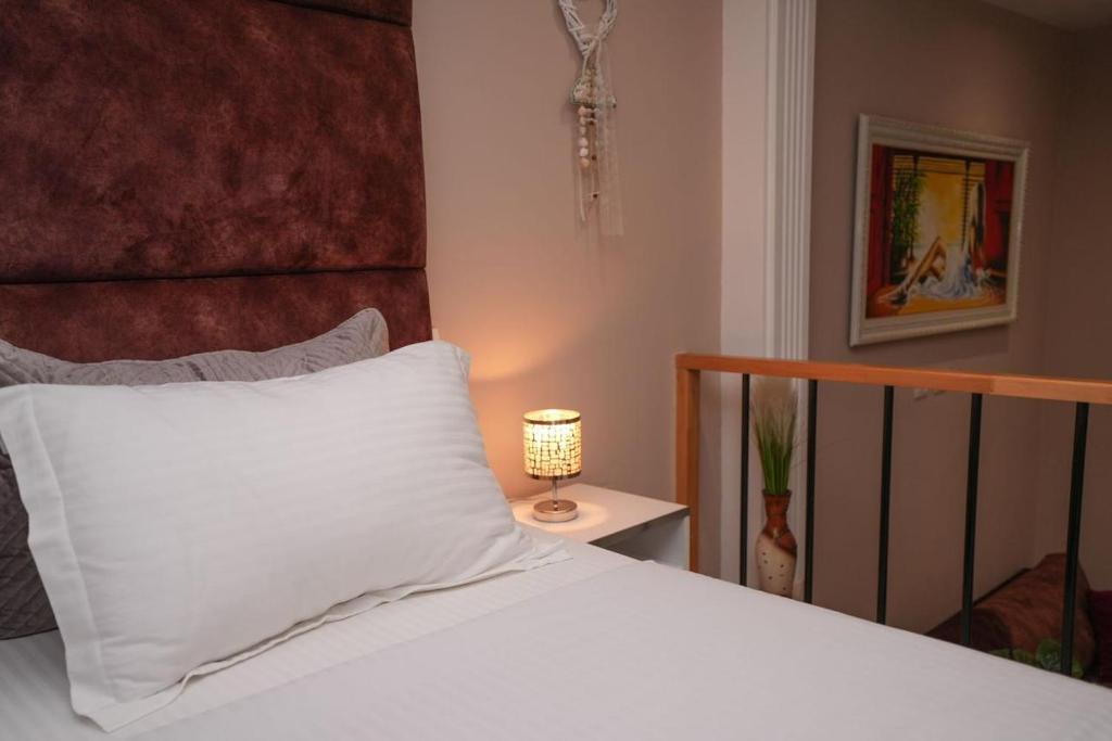 Postel nebo postele na pokoji v ubytování Hotel Kojku