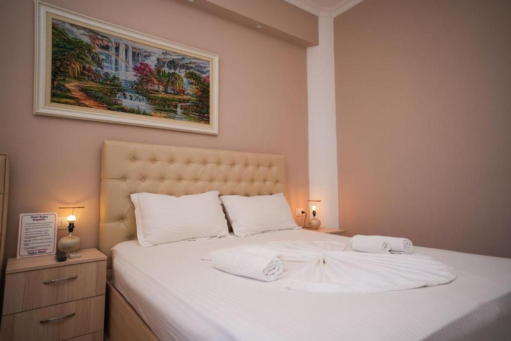 Postel nebo postele na pokoji v ubytování Hotel Kojku