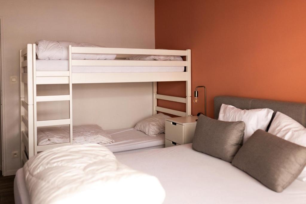 Postel nebo postele na pokoji v ubytování 2-slaapkamer app. Middelkerke