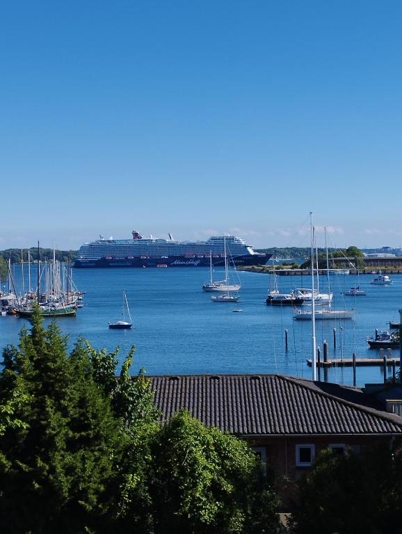a group of boats are docked in a harbor at Apartment am Yachthafen in Kiel