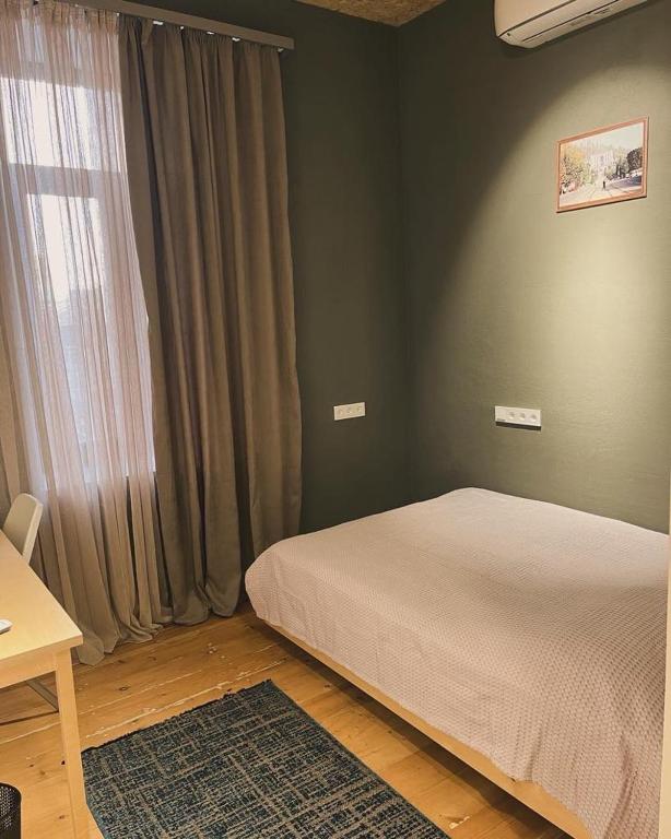 Postel nebo postele na pokoji v ubytování Blue Orange