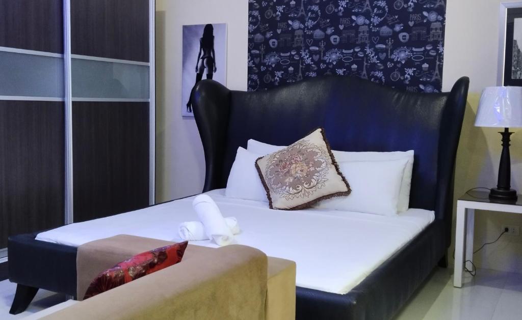 Ένα ή περισσότερα κρεβάτια σε δωμάτιο στο Jack Kandi Grosvenor Square