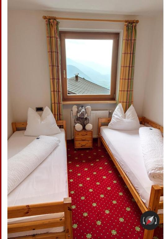 Postel nebo postele na pokoji v ubytování Hotel Tonnerhof