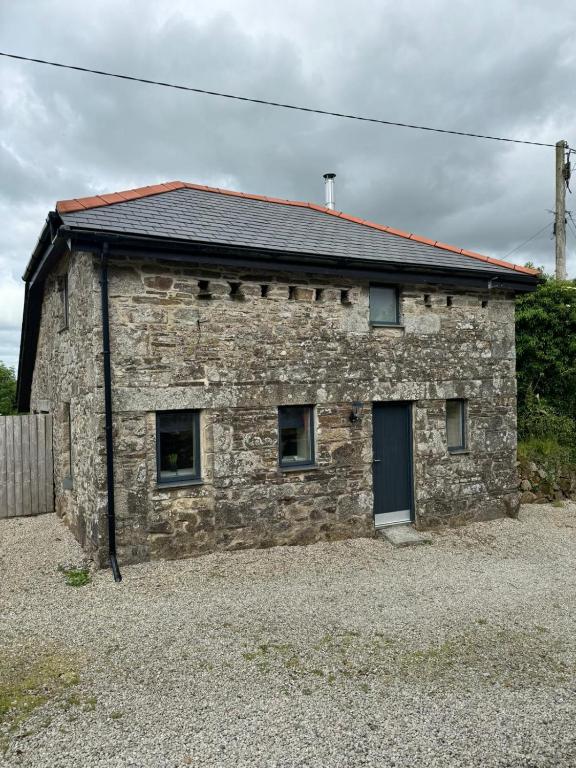 a stone house with a slate roof at Dovecot in Altarnun
